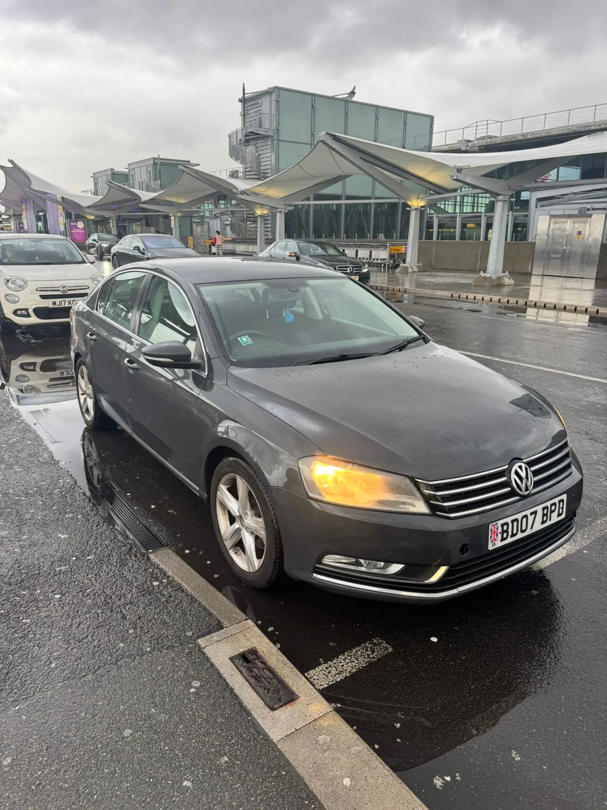 executive car outside the airport