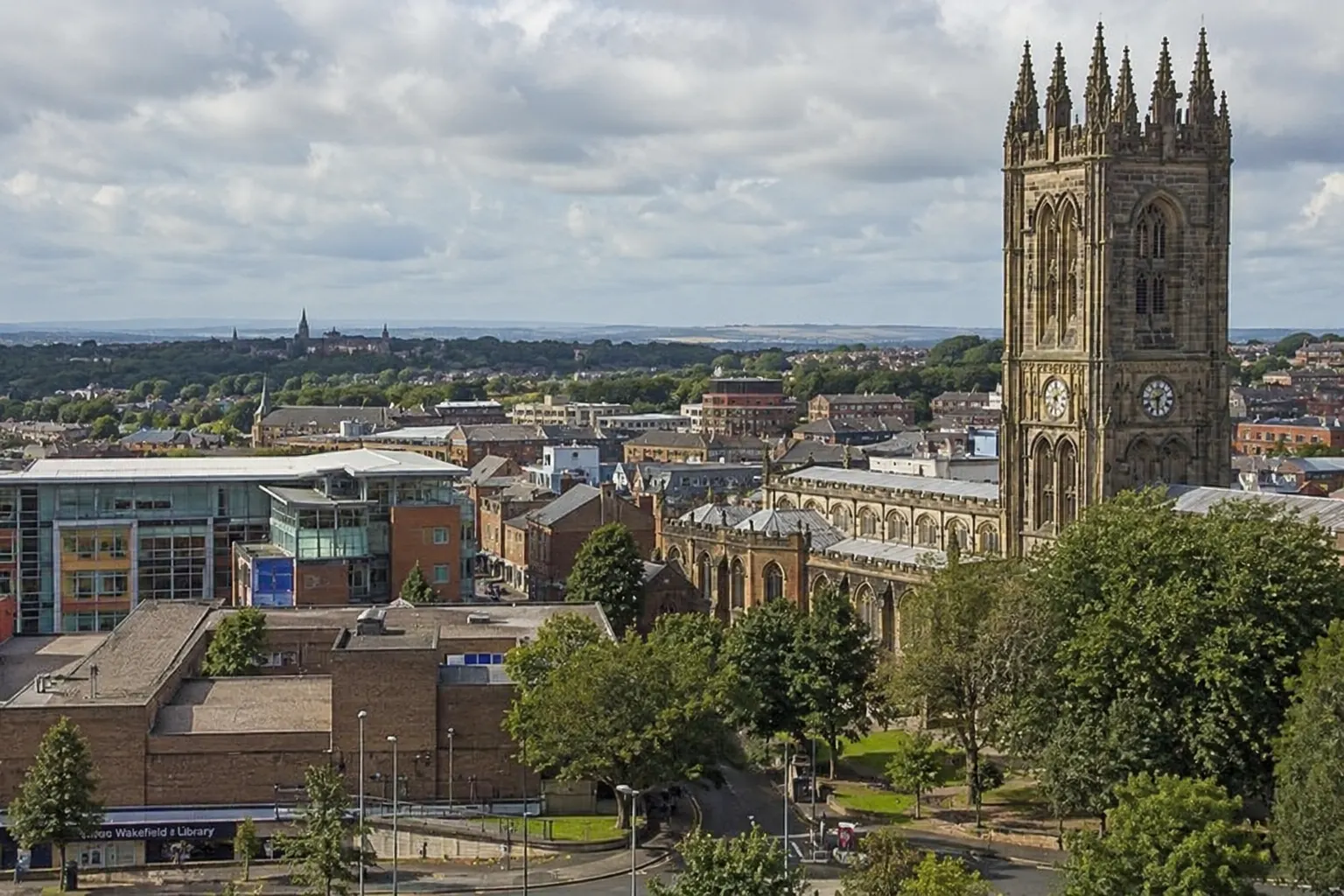 Cityscape with cathedral tower and greenery
