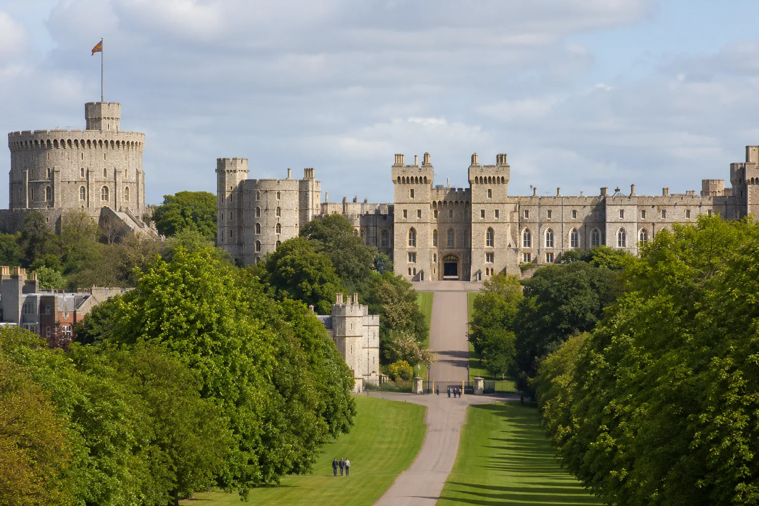 Royal castle with green pathway entrance